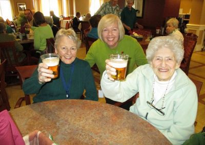 Park Place of Elmhurst residents celebrating Saint Patrick's Day in the Butterfield Dining Room