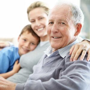A senior man with his daughter and grandson