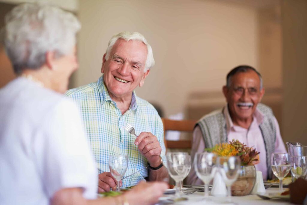 A group of residents dining at the Providence Dining Room Park Place of Elmhurst