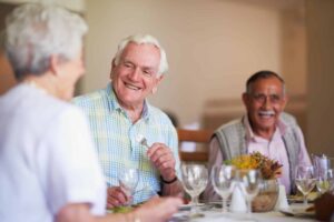 A group of residents dining at the Providence Dining Room Park Place of Elmhurst
