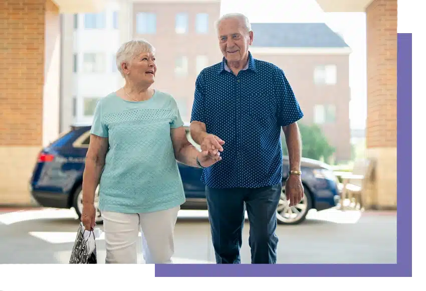 Senior couple holding hands