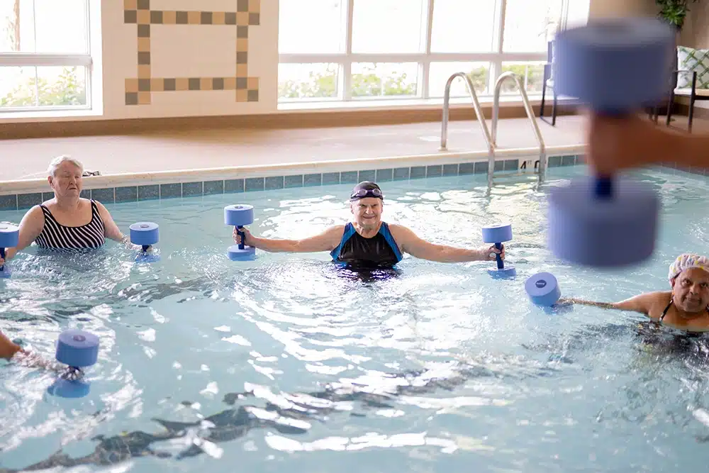 People exercise in the pool