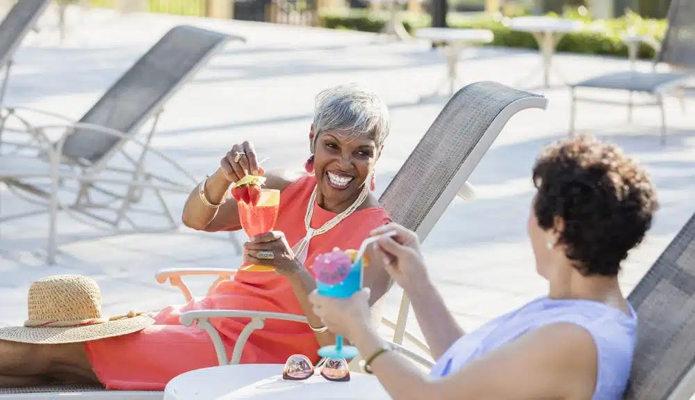 Women enjoying cocktails outdoors
