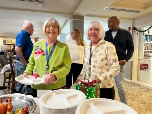 Two women enjoy holidays at Park Place of Elmhurst